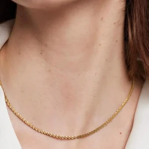 Fijne gouden bewerkte korte ketting
